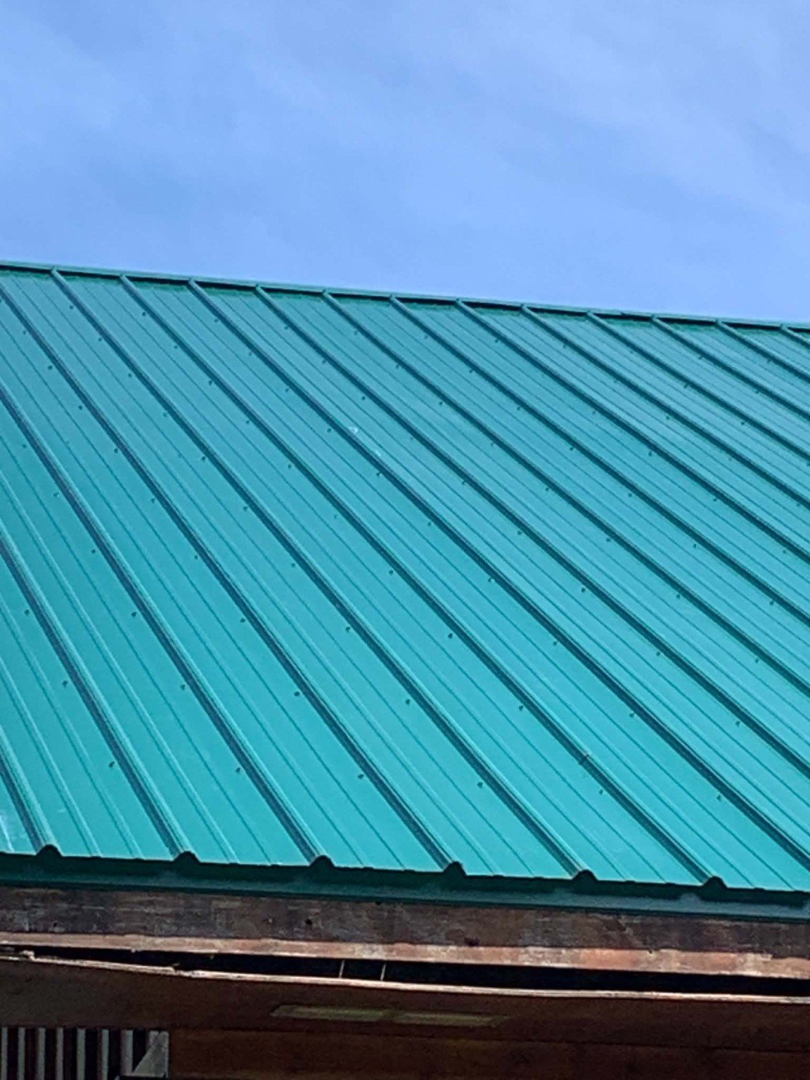 Finished metal roofing project by Iron Cross Builders